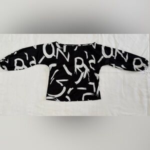 LONG SLEEVE BOAT NECK BLACK AND WHITE ABSTRACT BLOUSE